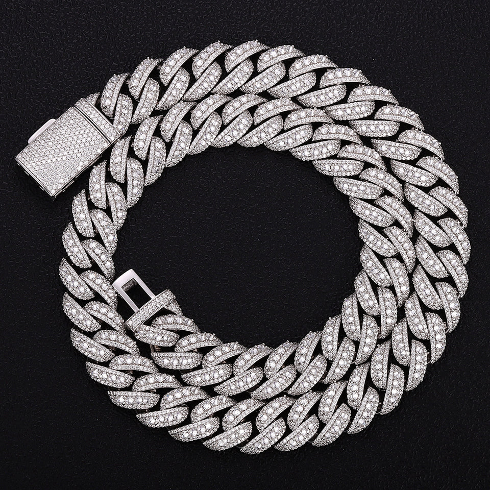 Iced out Cuban link chain 15mm held in hand showing S925 stamp