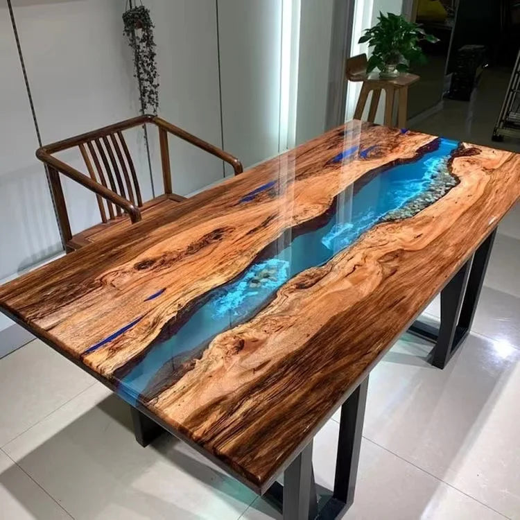 Wooden table with blue resin inlay in a modern interior setting