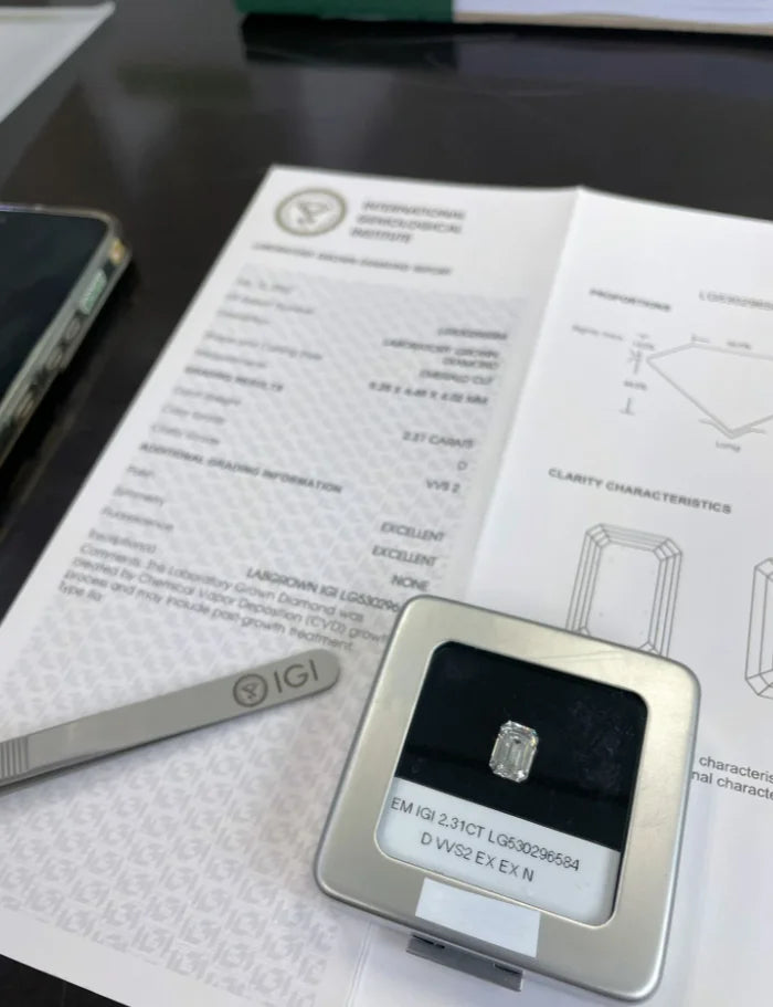 Diamond in a holder with certification on a table
