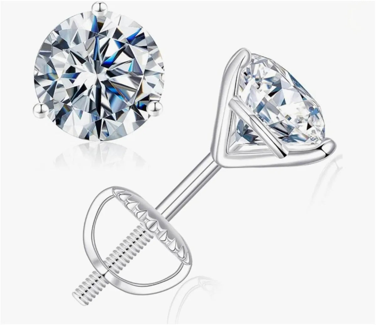 Silver stud earrings with clear gemstones on a white background