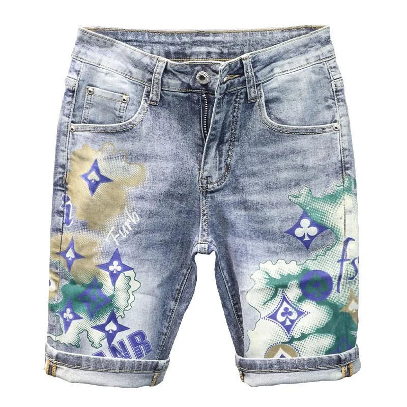 Denim shorts with colorful graphic designs on a white background