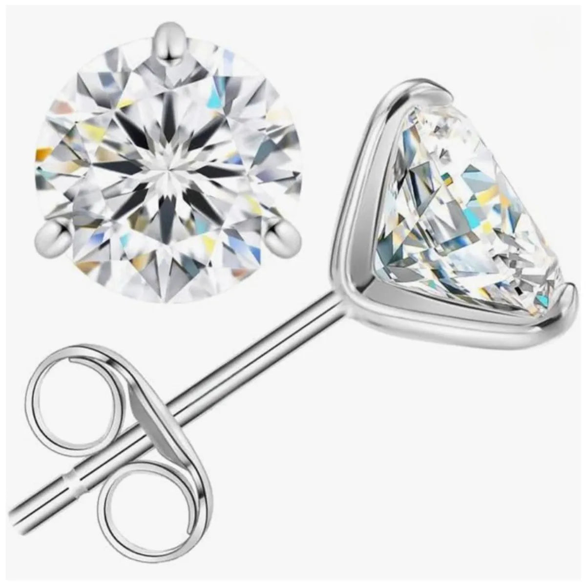 Pair of diamond stud earrings on a white background