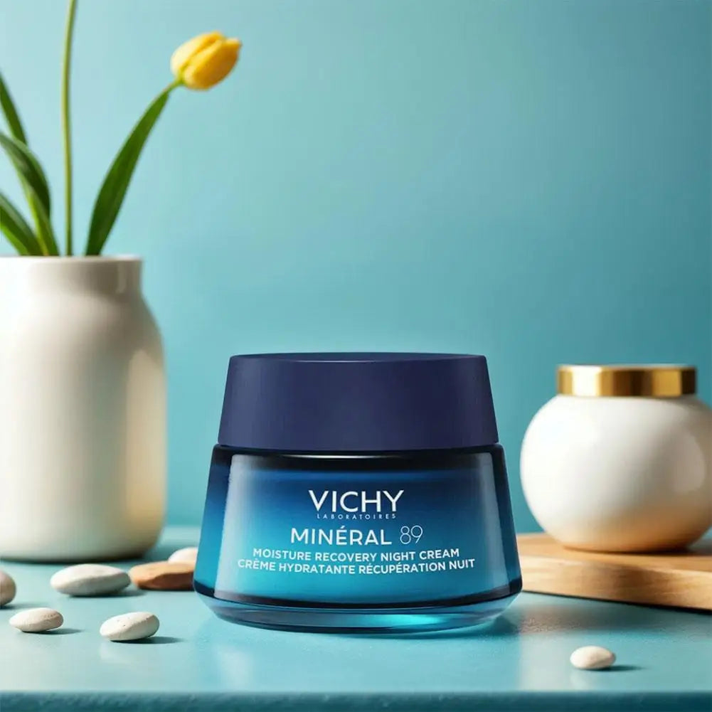Vichy Mineral 89 skincare product on a blue surface with decorative elements.