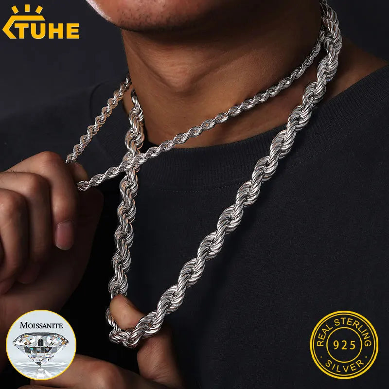 Silver rope chain necklace being held by a person, with TUHE branding and silver purity stamp.
