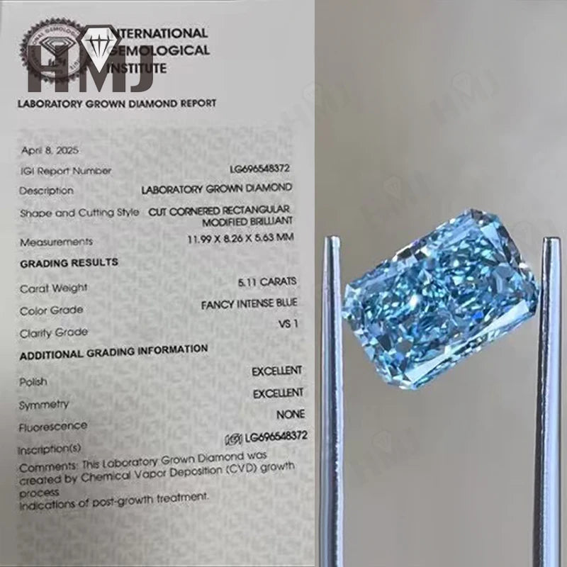 A laboratory-grown diamond held in metal tweezers beside a printed gemological institute report card. The diamond is light blue with a faceted rectangular/cornered shape.