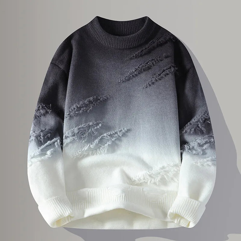 Gray and white distressed sweater on a gray background