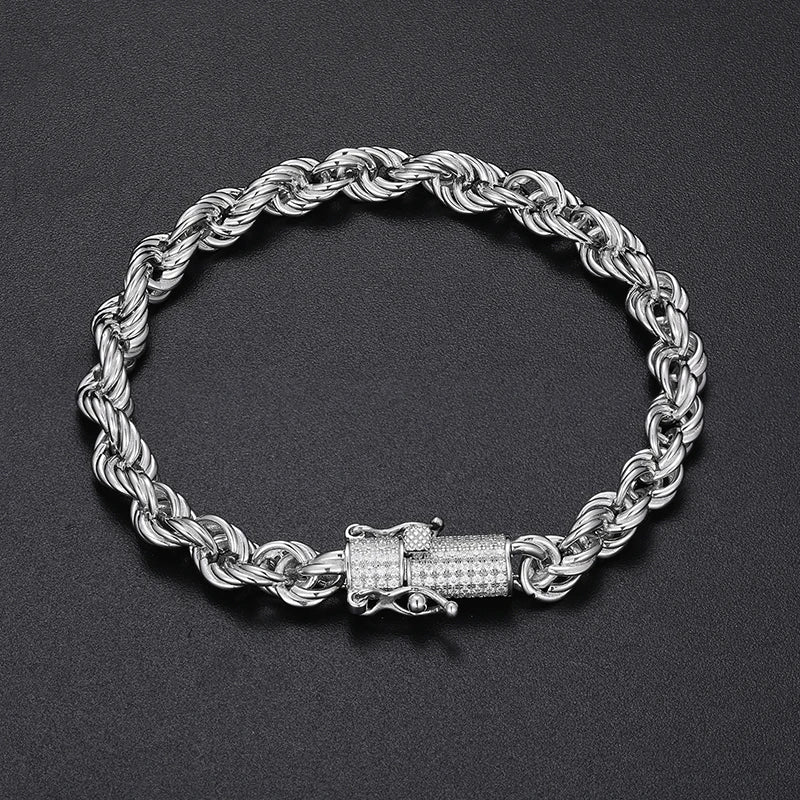 Silver rope chain bracelet with a clasp on a dark background