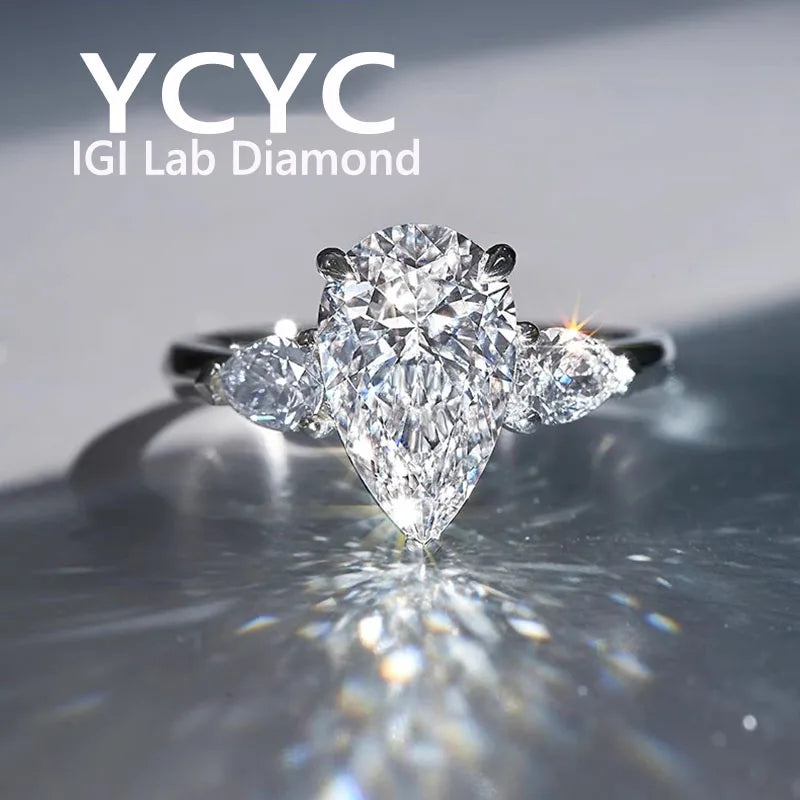 Diamond ring with 'YCYC IGI Lab Diamond' branding on a reflective surface.