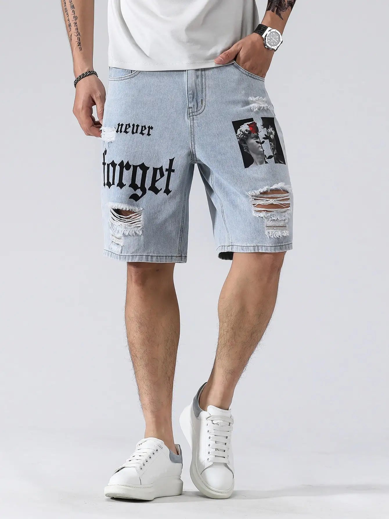 Person wearing light blue denim shorts with text and graphics on a white background