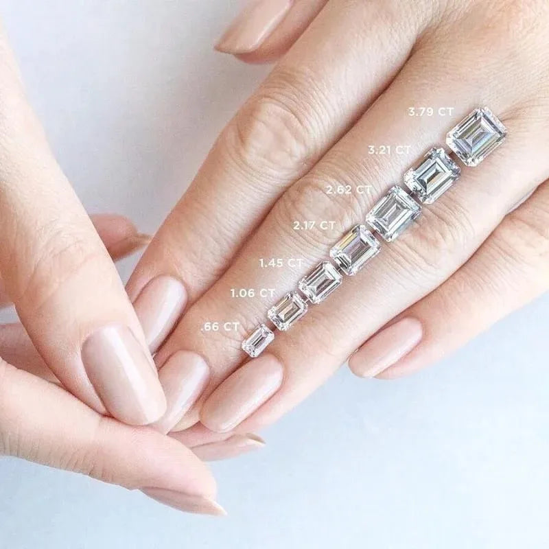 Diamond bracelet on a hand with diamond weight labels