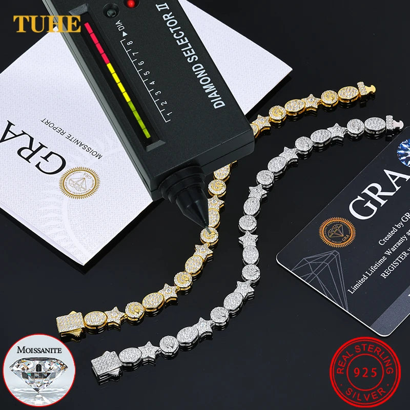 Gold and silver chain with diamond selector and GRA card on a black background