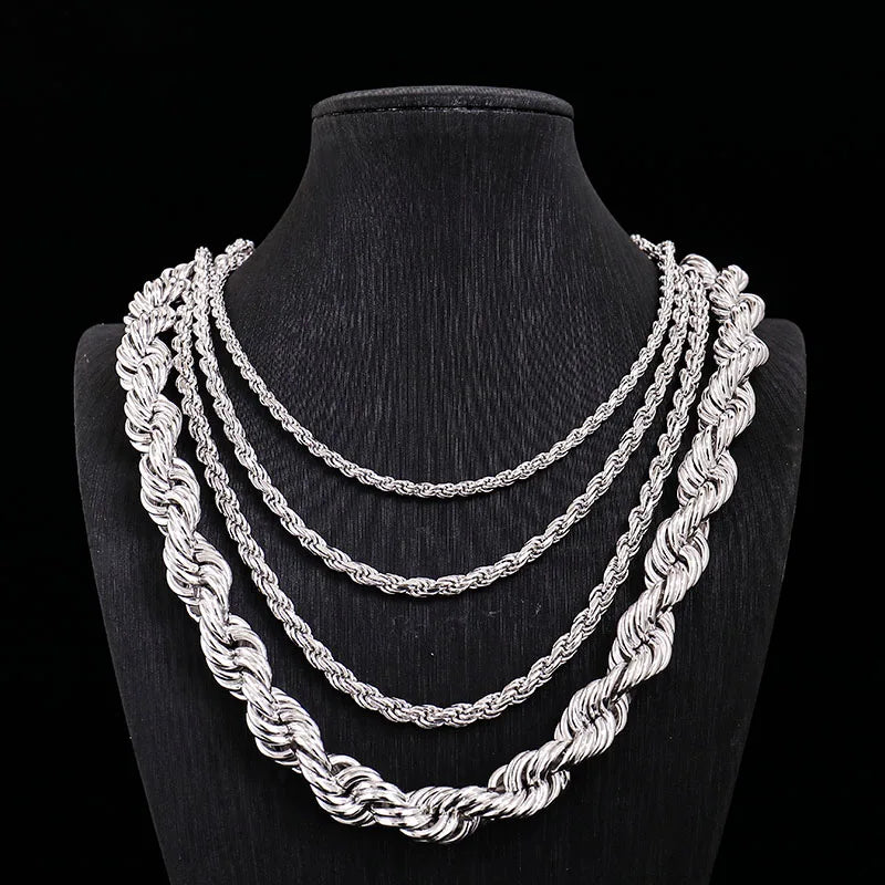 Silver rope chain necklace on a black mannequin bust against a black background