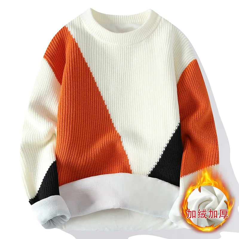 Color-blocked sweater with orange, black, and white pattern on a white background