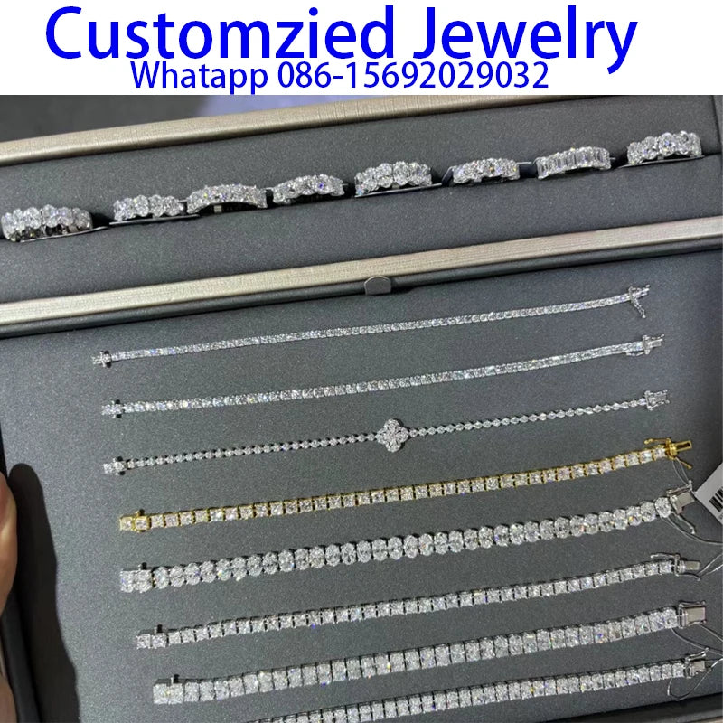 Collection of silver jewelry on a gray display card with 'Customzied Jewelry' branding.