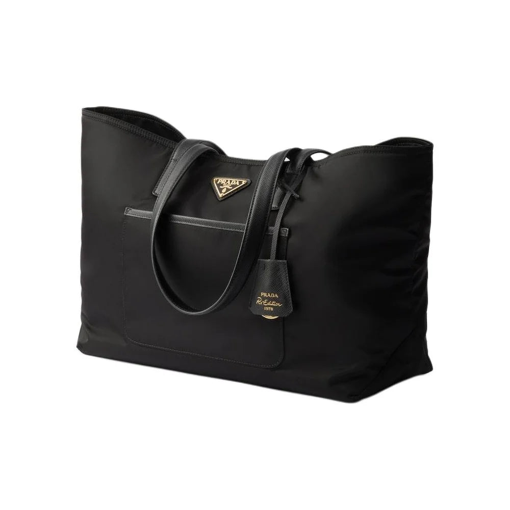Black Prada handbag on a white background