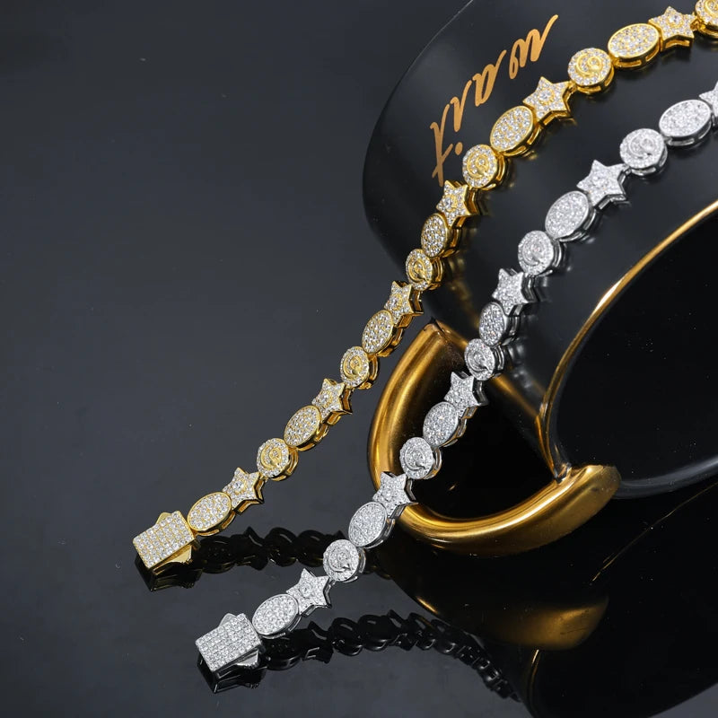 Two gold and silver bracelets on a black background with 'LVMH' branding.