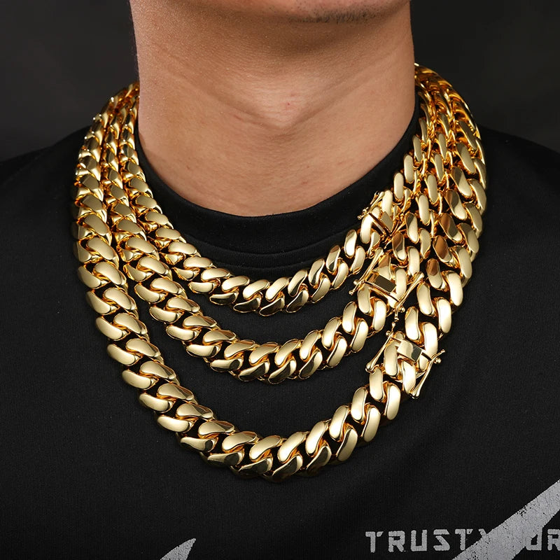 Gold chain necklace on a black background