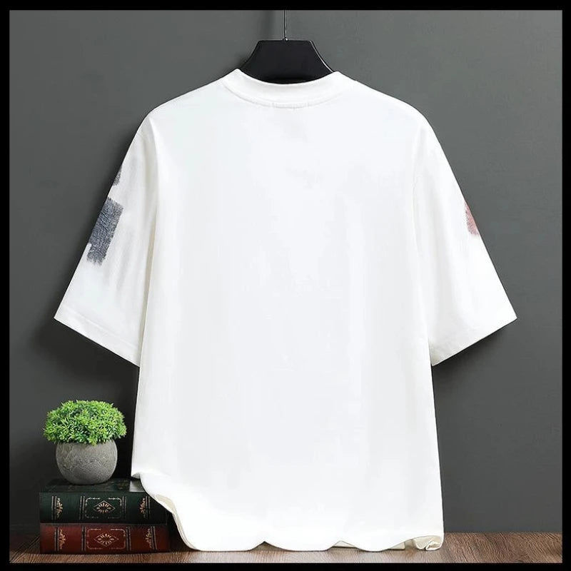 White t-shirt with black text on a dark gray background