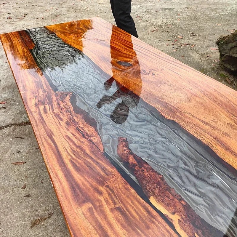 Wooden table with a unique grain pattern on a concrete surface